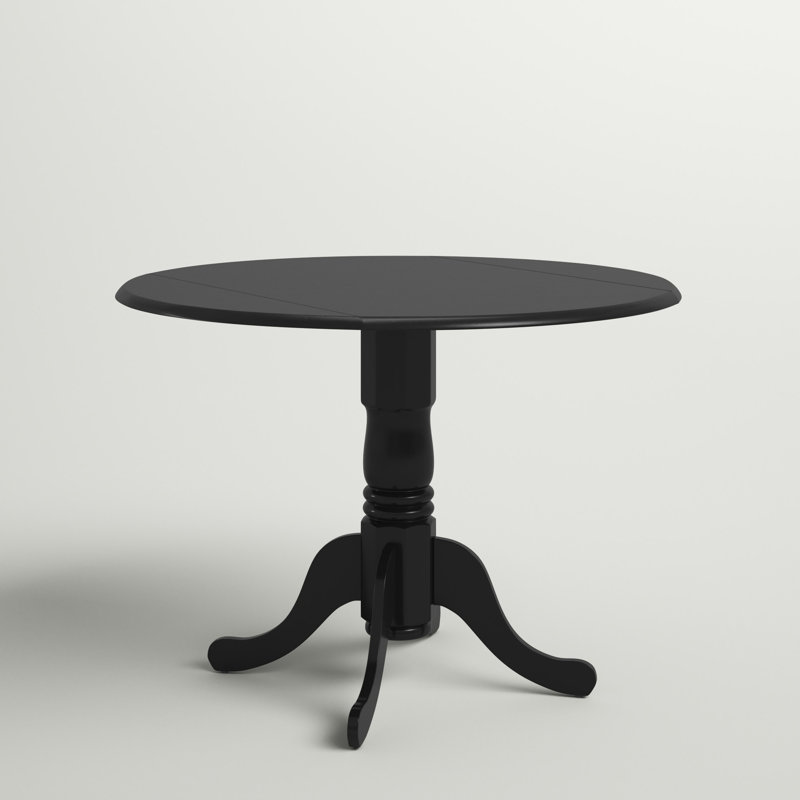 Three Posts™ Boothby Drop Leaf Solid Wood Pedestal Dining Table